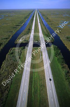 An aerial view of Interstate 75 alligator alley in the Florida Everglades.