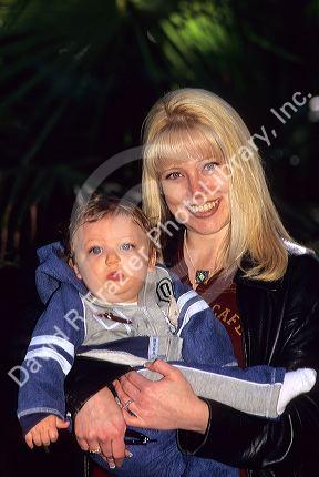 Mother holding her infant son.  MODEL RELEASED