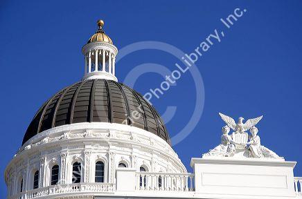 The dome and sculpture on top of the California state capitol building in Sacramento.