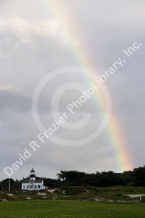 Rainbow over Point Pinos lighthouse at Pacific Grove, California.