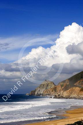 Waves and beach north of Half Moon Bay, California.
