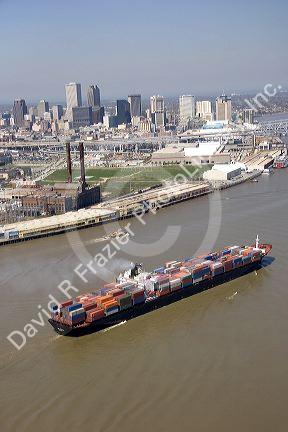 Container ship on the Mississippi River departing New Orleans, Louisiana.