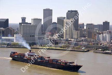 Container ship on the Mississippi River departing New Orleans, Louisiana.