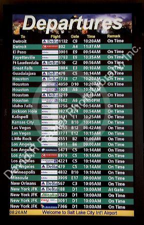 Electronic flight time departure screen at Salt Lake City International Airport, Utah.