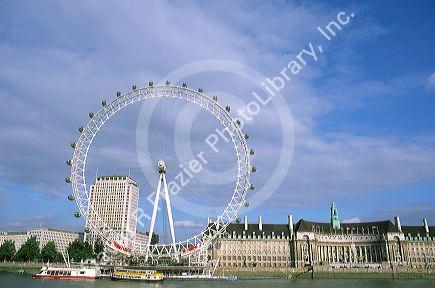 London Eye ferris wheel along the Thames River in London, England.