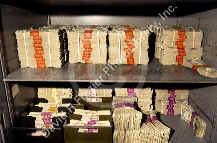Cash money in a bank vault.