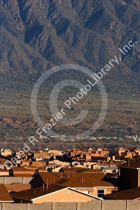 Housing development at Bernalillo, New Mexico in the area of Albuquerque.  Sandia Mountains in background.