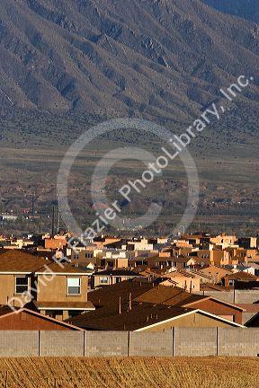 Housing development at Bernalillo, New Mexico in the area of Albuquerque.  Sandia Mountains in background.