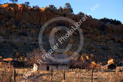 Old homestead at sunset along US highway 550 near Cuba, New Mexico.