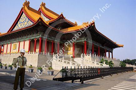 A guard stands in front of the theater at Chiang Kai-Shek Memorial in Taipei, Taiwan.