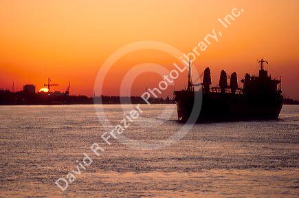 Ship at sunset on the Mississippi River near New Orleans.