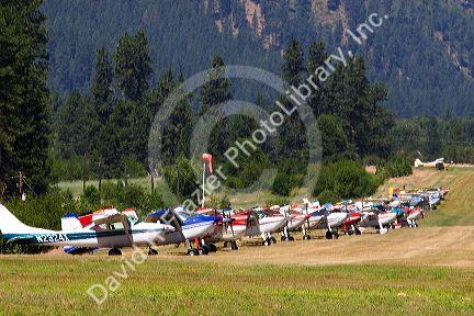 Airstrip with airplanes parked at Garden Valley in the Boise National Forest, Idaho.  Heat waves distort the image.