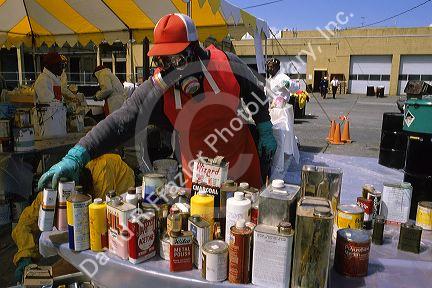 Volunteers help dispose of toxic household products such as paint and cleaners in Seattle, Washington.