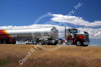Truck hauling gasoline on the highway.