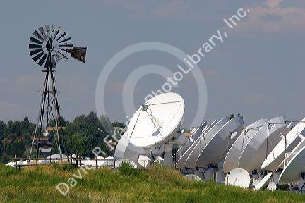 Old windmill and modern satellite dishes at Cheyenne, Wyoming.