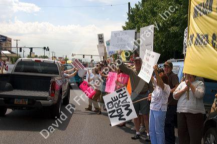 People holding signs at an Anti-war protest in Salt Lake City, Utah. 8/22/2005