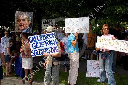 People holding signs at an Anti-war protest in Salt Lake City, Utah. 8/22/2005