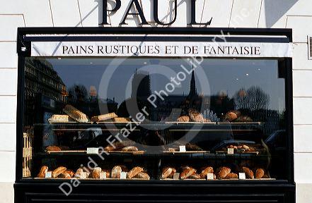 The display window of a bakery in Paris, France.
