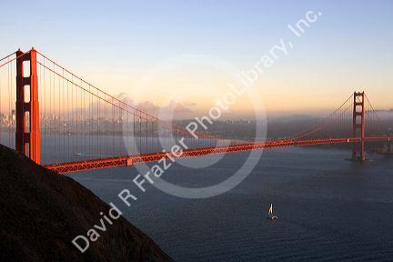 A sailboat near the Golden Gate Bridge in the San Francisco Bay, California.