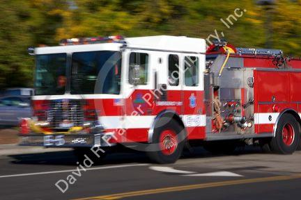 A fire truck in motion responding to an alarm. Boise, Idaho.
