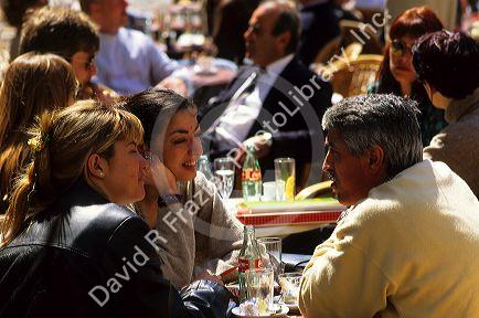 People dine at a sidewalk cafe in Palma de Majorca, Spain.