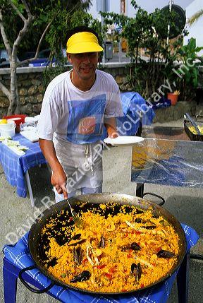 A traditional spanish Paella seafood and rice dish at Nerja, Spain.
