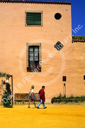 Tourists at Alcazar in Seville, Spain.