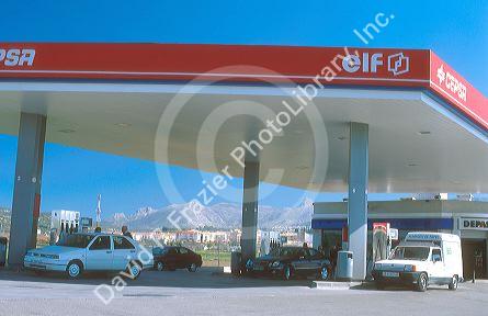 Gas service station with mountains in the background.  Granada, Spain.