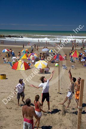 People play volleyball on the beach near Miramar Argentina.