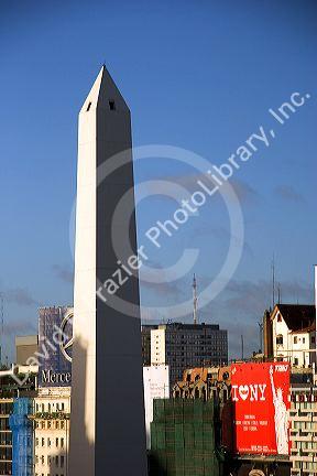 The Obelisk and high rise buildings in Buenos Aires, Argentina at sunrise.