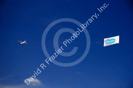 Airplane flying with advertisement in Argentina.