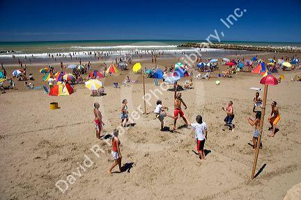 People play volleyball on the beach near Miramar Argentina.