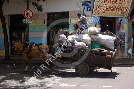Horse drawn junk wagon in the La Boca area of Buenos Aires, Argentina.