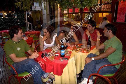 Young Argentine adults having drinks in Buenos Aires, Argentina.  (model released)