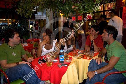 Young Argentine adults having drinks in Buenos Aires, Argentina.   (model released)