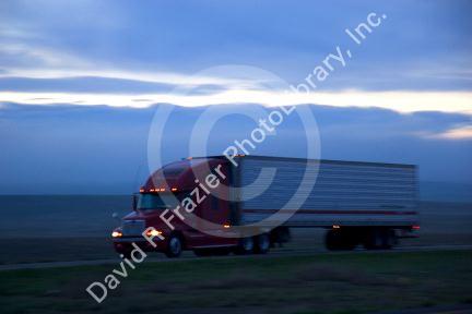 Truck on Interstate 84 in Idaho at dawn.