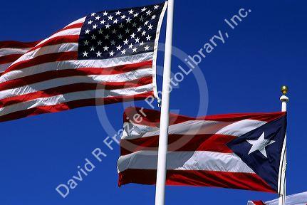 The flag of the United States of America and the flag of Puerto Rico.