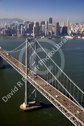 Aerial view of traffic on the bay bridge and the city of San Francisco, California.