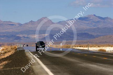 Mirage on U.S. 95 near Fallon, Nevada.  Heat waves create the illusion of water on the paved surface of the road.