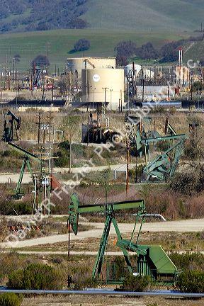 Oil wells and tanks at the San Ardo field along US 101, California.