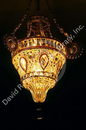 Ornate chandelier in a hotel room at the Geiser Grand Hotel in Baker, Oregon.