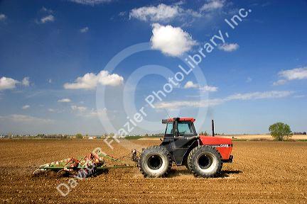 A tractor spring tilling a crop in Canyon County, Idaho.