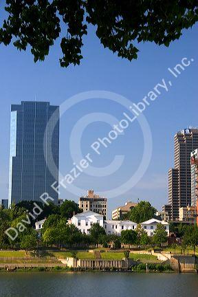 Old Statehouse and modern office buildings along the Arkansas River at Little Rock, Arkansas.