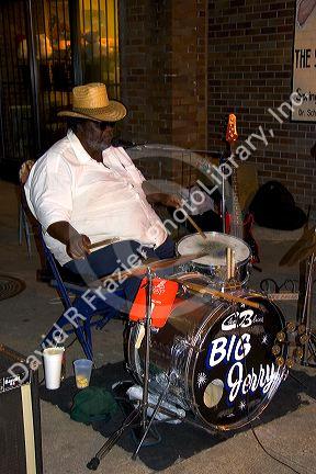 A musician playing the drums on Beale Street in Memphis, Tennessee.