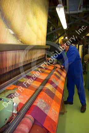 Textile loom in the Garnier-Thiebaut factory at Gerardmer, France.