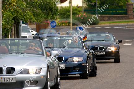 BMW cars on the road near Ribeauville, France.