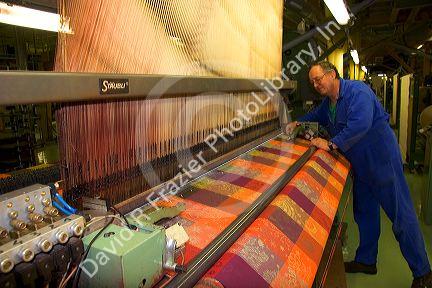 Textile loom in the Garnier-Thiebaut factory at Gerardmer, France.