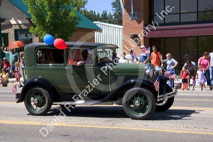 Antique automobile in a small town Fourth of July parade in Cascade, Idaho.