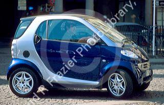Mercedes Smart car in Italy.  The tiny two seater is popular with Italians.