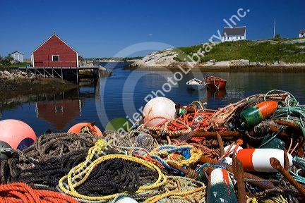 Lobster pots, buoys, and ropes on the dock at Peggy's Cove, Nova Scotia, Canada.